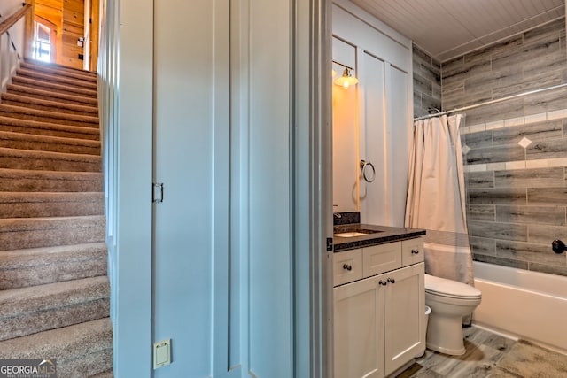 899 Ridge Pointe Way, Blairsville, GA 30512 - full bathroom with wooden walls, vanity, shower / tub combo with curtain, and wood finished floors