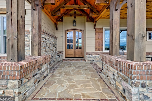 899 Ridge Pointe Way, Blairsville, GA 30512 - view of exterior entry featuring stone siding and a porch