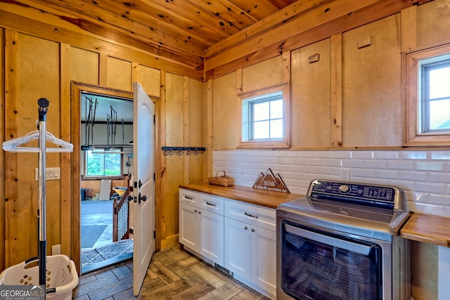 899 Ridge Pointe Way, Blairsville, GA 30512 - kitchen featuring washer / clothes dryer, butcher block countertops, healthy amount of natural light, white cabinets, and wood ceiling