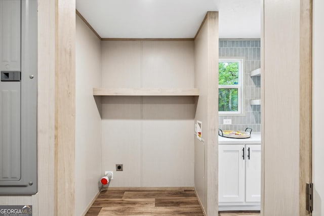 1413 Hephzibah Mcbean Rd, Hephzibah, GA 30815 - laundry room featuring hookup for an electric dryer and wood finished floors