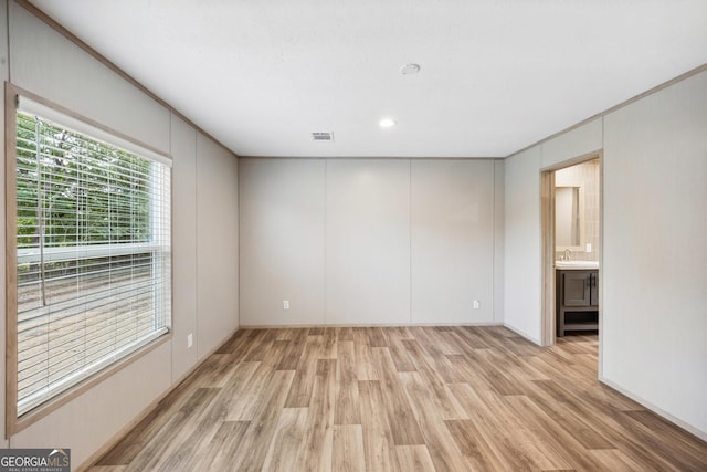 1413 Hephzibah Mcbean Rd, Hephzibah, GA 30815 - unfurnished room featuring light wood-style floors and recessed lighting
