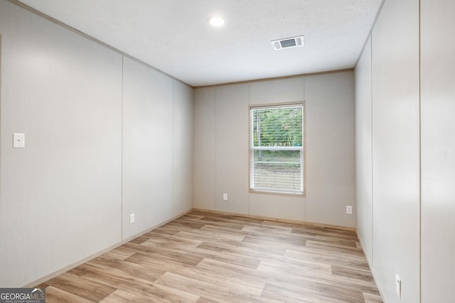 1413 Hephzibah Mcbean Rd, Hephzibah, GA 30815 - spare room with light wood-style flooring