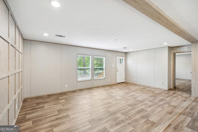 1413 Hephzibah Mcbean Rd, Hephzibah, GA 30815 - spare room with light wood finished floors, recessed lighting, and a decorative wall