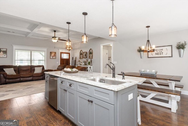311 Kendall Ct, Perry, GA 31069 - kitchen with gray cabinetry, dark wood-type flooring, open floor plan, light stone counters, and beam ceiling