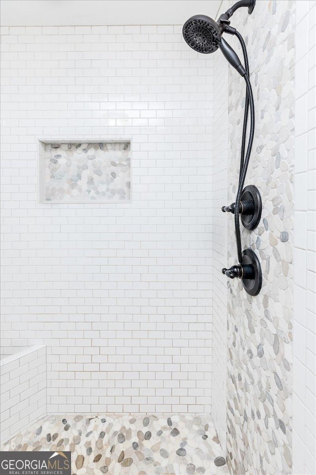 311 Kendall Ct, Perry, GA 31069 - bathroom with a tile shower