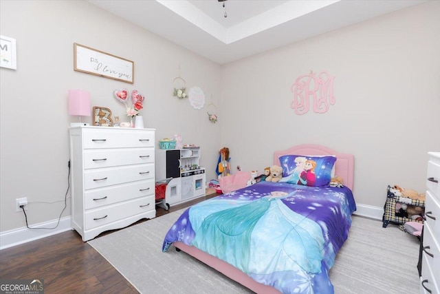 311 Kendall Ct, Perry, GA 31069 - bedroom with dark wood-type flooring and baseboards