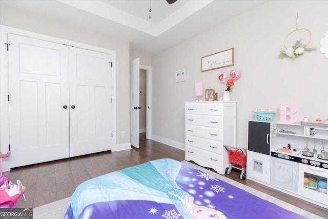 311 Kendall Ct, Perry, GA 31069 - bedroom with dark wood-style flooring and a closet