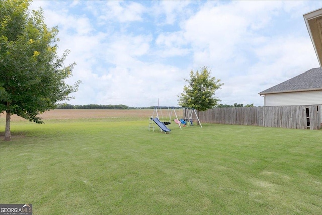 311 Kendall Ct, Perry, GA 31069 - view of yard featuring a playground