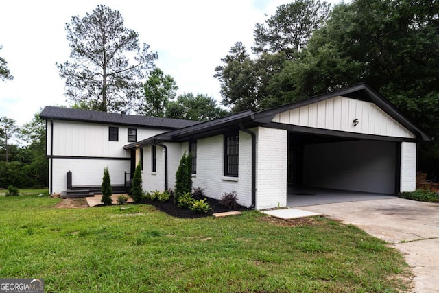 69 N Hearn Rd, Ellenwood, GA 30294 - split level home with brick siding, a front lawn, and concrete driveway