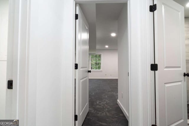 69 N Hearn Rd, Ellenwood, GA 30294 - corridor featuring recessed lighting and dark marble finish floors