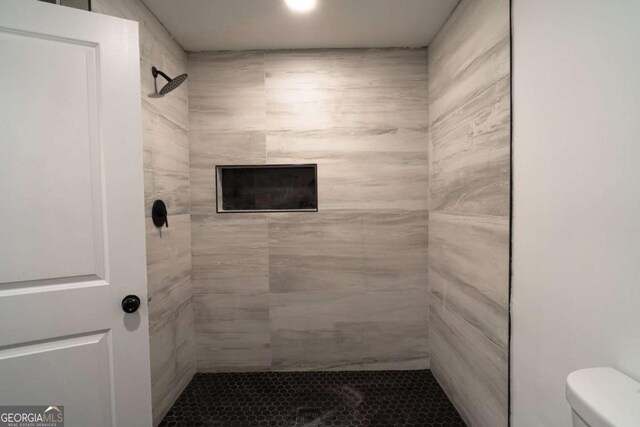 69 N Hearn Rd, Ellenwood, GA 30294 - full bath featuring tiled shower and toilet