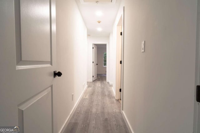 69 N Hearn Rd, Ellenwood, GA 30294 - hallway with wood finished floors and baseboards