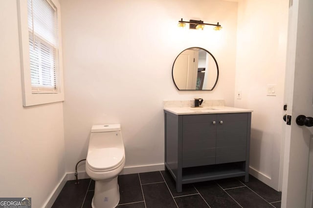 69 N Hearn Rd, Ellenwood, GA 30294 - half bathroom with vanity and tile patterned flooring