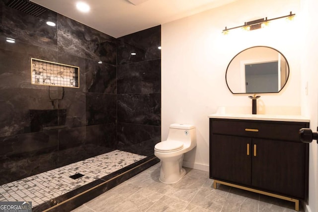 69 N Hearn Rd, Ellenwood, GA 30294 - bathroom featuring vanity and a tile shower