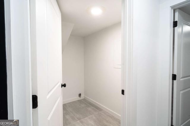69 N Hearn Rd, Ellenwood, GA 30294 - washroom with baseboards and light tile patterned flooring