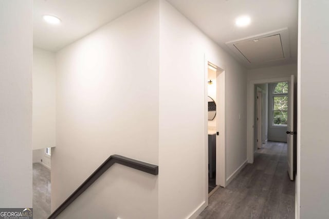 69 N Hearn Rd, Ellenwood, GA 30294 - corridor featuring attic access, wood finished floors, an upstairs landing, and recessed lighting