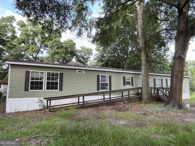 175 Bob White St, Jesup, GA 31545 - manufactured / mobile home featuring a wooden deck