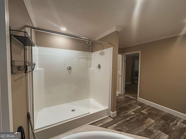 175 Bob White St, Jesup, GA 31545 - full bath featuring a shower stall, wood finished floors, and ornamental molding