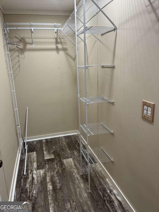 175 Bob White St, Jesup, GA 31545 - walk in closet featuring wood finished floors