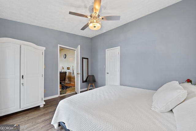 321 Barbara Point Rd, Sparta, GA 31087 - bedroom with wood finished floors and a ceiling fan