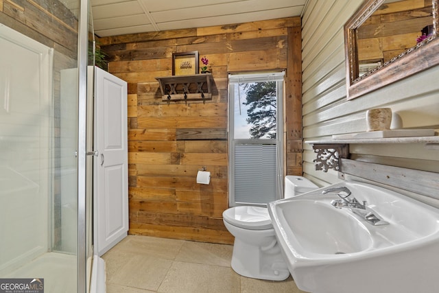 321 Barbara Point Rd, Sparta, GA 31087 - bathroom with wooden walls and a stall shower