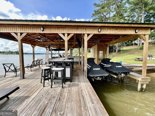 321 Barbara Point Rd, Sparta, GA 31087 - dock area featuring boat lift and a water view