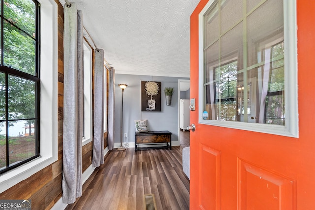 321 Barbara Point Rd, Sparta, GA 31087 - foyer with wood finished floors and a textured ceiling
