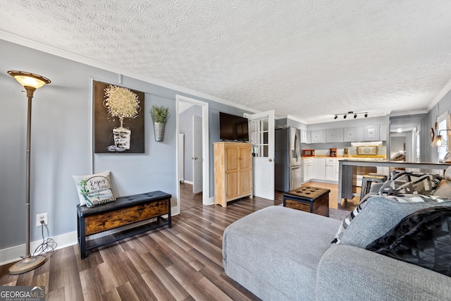 321 Barbara Point Rd, Sparta, GA 31087 - living area featuring a textured ceiling, dark wood-style floors, and crown molding