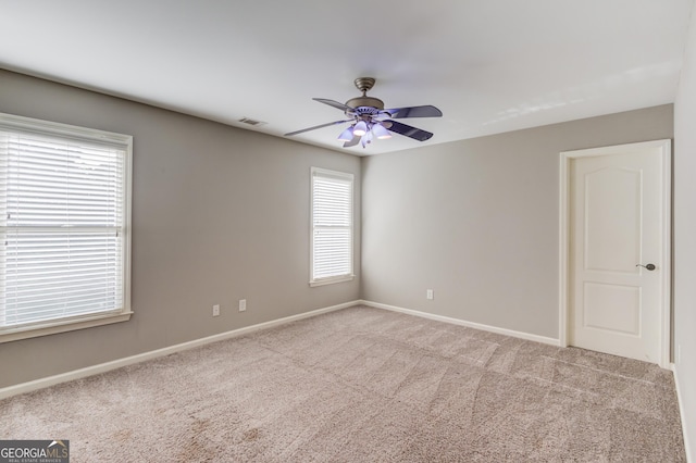 3217 Aberrone Pl, Buford, GA 30519 - carpeted spare room featuring baseboards and a ceiling fan
