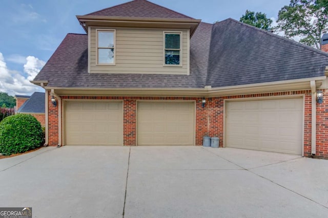 3217 Aberrone Pl, Buford, GA 30519 - view of front facade with brick siding, roof with shingles, and driveway