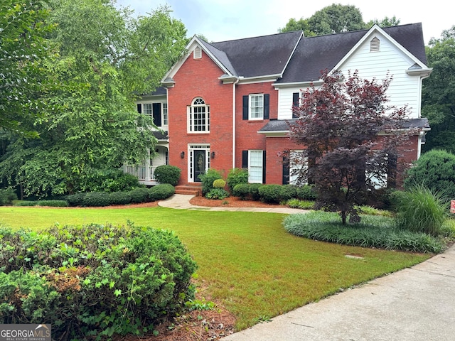 361 Fairway Cir, Monroe, GA 30656 - view of front of house with a front lawn and brick siding