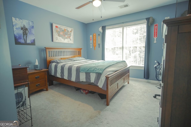 361 Fairway Cir, Monroe, GA 30656 - bedroom featuring light carpet and a ceiling fan