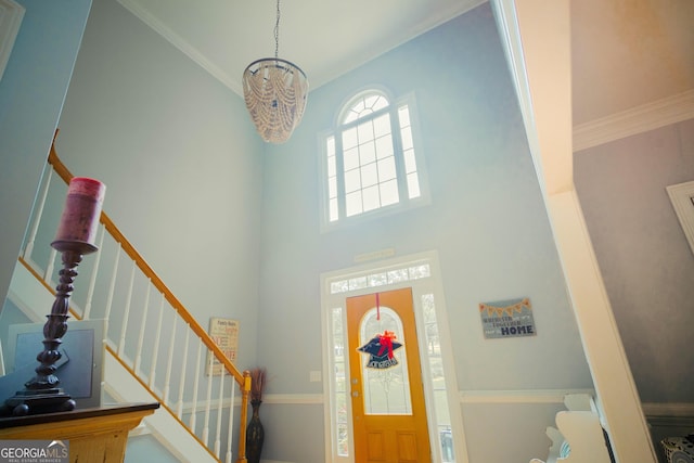 361 Fairway Cir, Monroe, GA 30656 - entryway featuring a chandelier, stairway, and a high ceiling