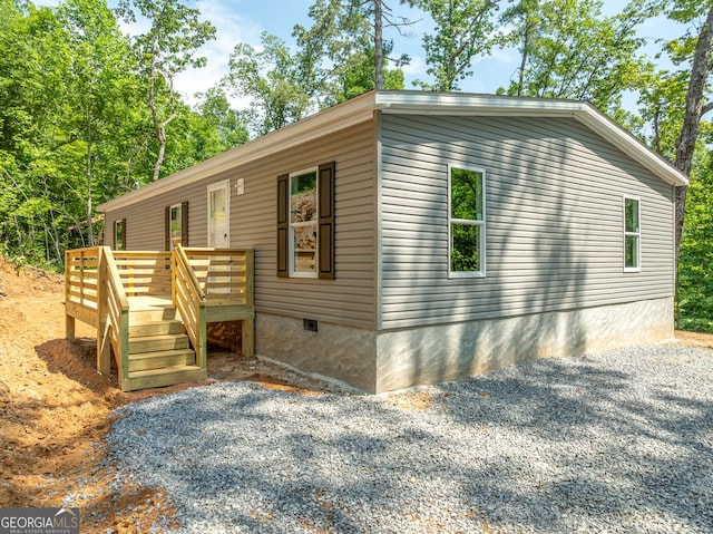 134 Double Line Rd, Ellijay, GA 30540 - manufactured / mobile home featuring crawl space and a wooden deck