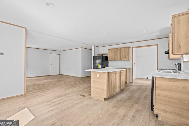 134 Double Line Rd, Ellijay, GA 30540 - kitchen with freestanding refrigerator, a center island, light wood finished floors, and crown molding