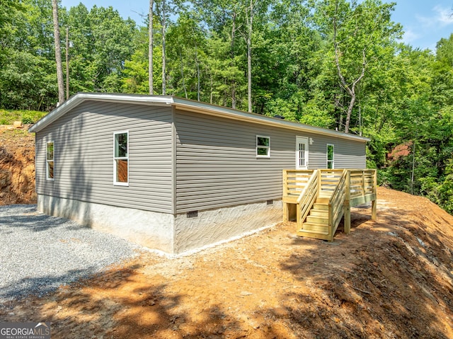 134 Double Line Rd, Ellijay, GA 30540 - back of property with crawl space and a deck