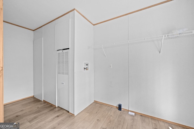 134 Double Line Rd, Ellijay, GA 30540 - washroom with washer hookup, a heating unit, light wood-style floors, and crown molding