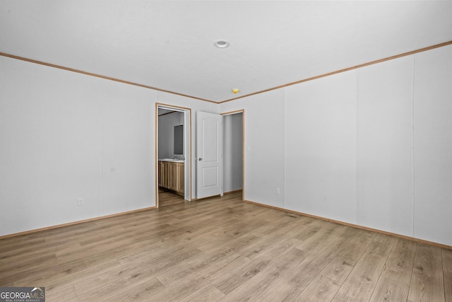 134 Double Line Rd, Ellijay, GA 30540 - unfurnished room with light wood-style flooring and crown molding