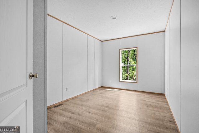 134 Double Line Rd, Ellijay, GA 30540 - empty room with light wood-style flooring and crown molding