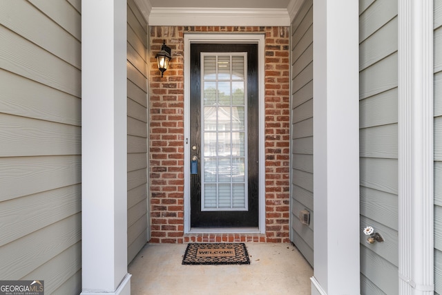 3511 Brockenhurst Dr, Buford, GA 30519 - view of exterior entry featuring brick siding and a porch