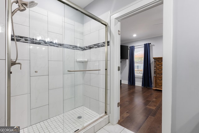 1967 Cogar Dr, Decatur, GA 30032 - full bathroom with a stall shower, ornamental molding, and wood finished floors