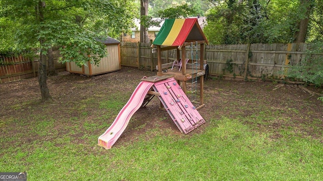 1777 Cedar Shoals Dr Unit 1775, Athens, GA 30605 - view of jungle gym featuring a fenced backyard and a storage unit