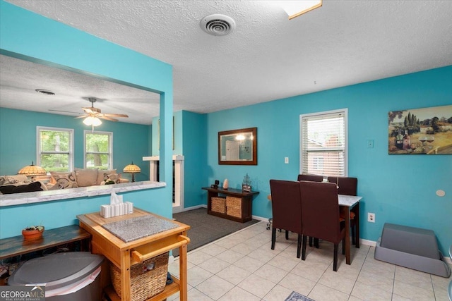 1777 Cedar Shoals Dr Unit 1775, Athens, GA 30605 - dining room with a textured ceiling, ceiling fan, and light tile patterned floors