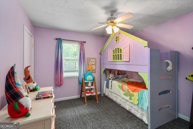 1777 Cedar Shoals Dr Unit 1775, Athens, GA 30605 - bedroom featuring a textured ceiling, dark carpet, and a ceiling fan