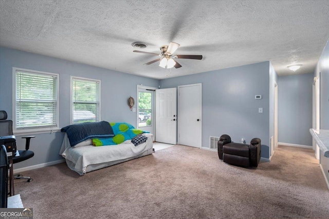 1777 Cedar Shoals Dr Unit 1775, Athens, GA 30605 - bedroom with carpet flooring, ceiling fan, and a textured ceiling