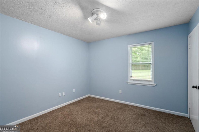 1777 Cedar Shoals Dr Unit 1775, Athens, GA 30605 - carpeted spare room with a textured ceiling