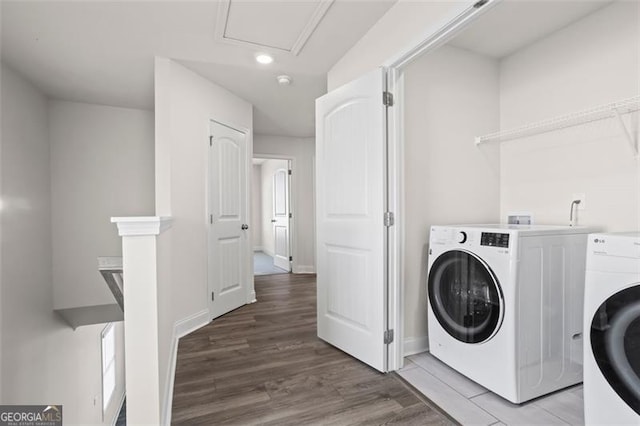 3382 Monarch Ave, Duluth, GA 30096 - laundry room featuring washing machine and clothes dryer, light wood-style floors, and recessed lighting