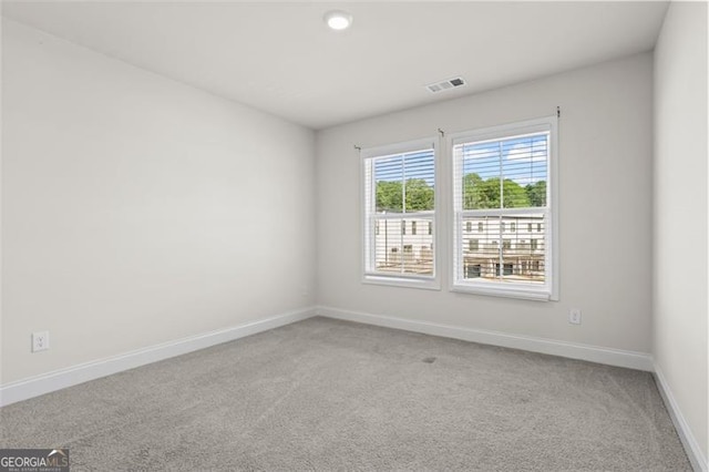 3382 Monarch Ave, Duluth, GA 30096 - carpeted spare room featuring baseboards and recessed lighting
