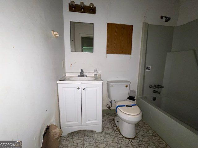 2369 Christian Cir, Covington, GA 30016 - bathroom featuring vanity and tub / shower combination