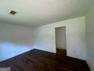 2369 Christian Cir, Covington, GA 30016 - unfurnished room featuring a textured ceiling